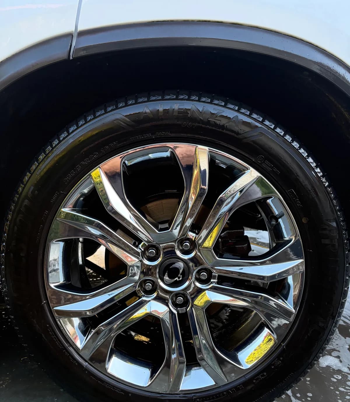 Chrome alloy wheel and tyre gleaming after a wheel clean by Bay Auto Detailing